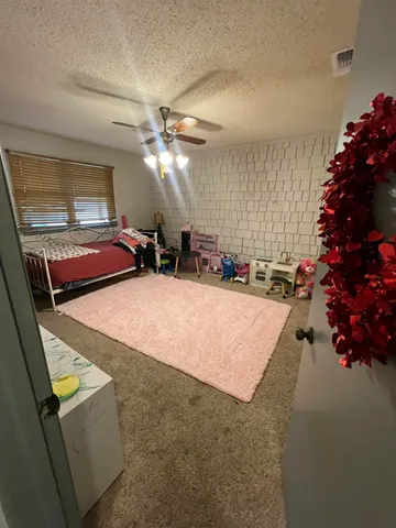 a bathroom with a sink mirror and a bathtub