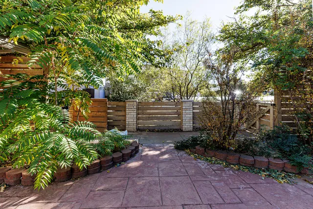 a view of a house with a tree
