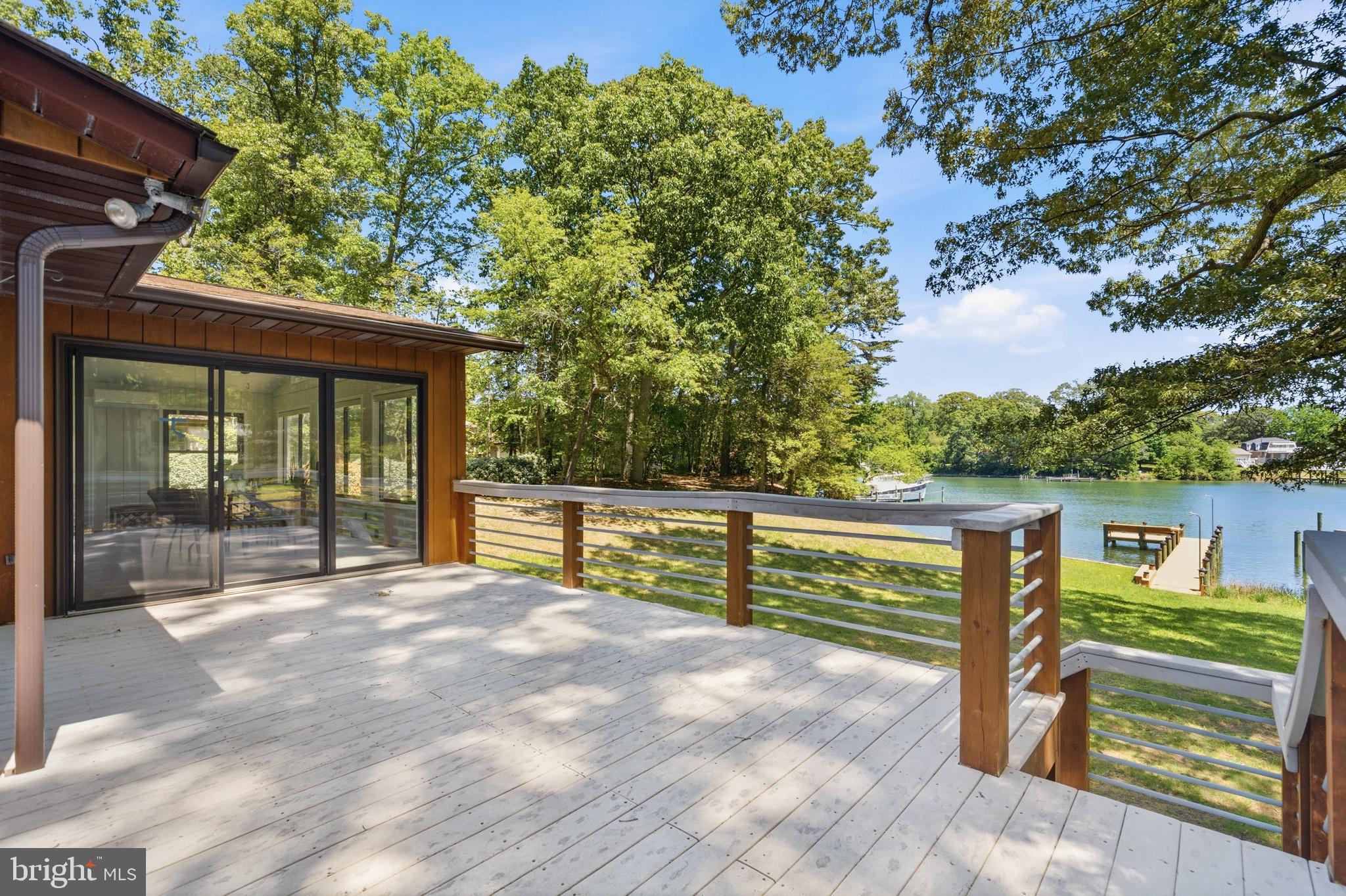 18040 Shipping Point Road Lexington Park, MD 20653 - Photo 6 of 75 Large deck for enjoying the outdoors.