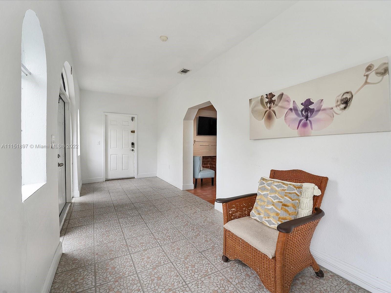 23 Northeast 46th Street Miami, FL 33137 - Photo 3 of 27 a view of livingroom with furniture and ceiling fan