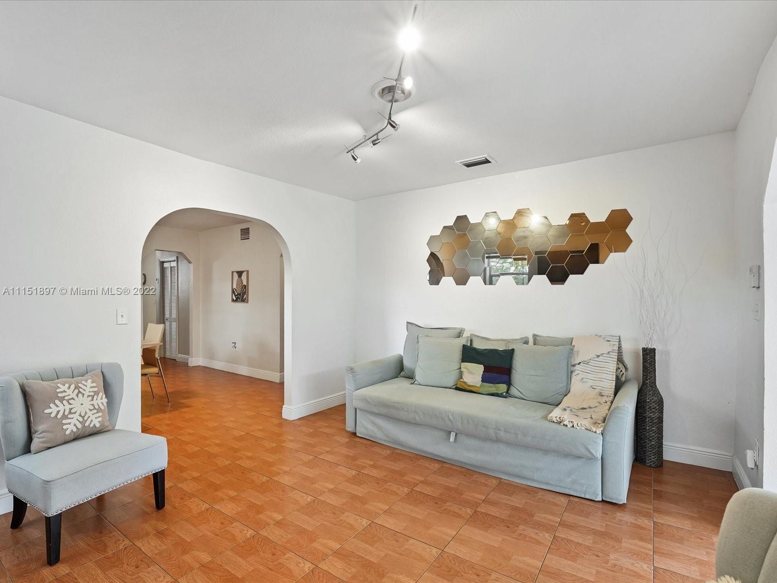 23 Northeast 46th Street Miami, FL 33137 - Photo 6 of 27 a living room with furniture