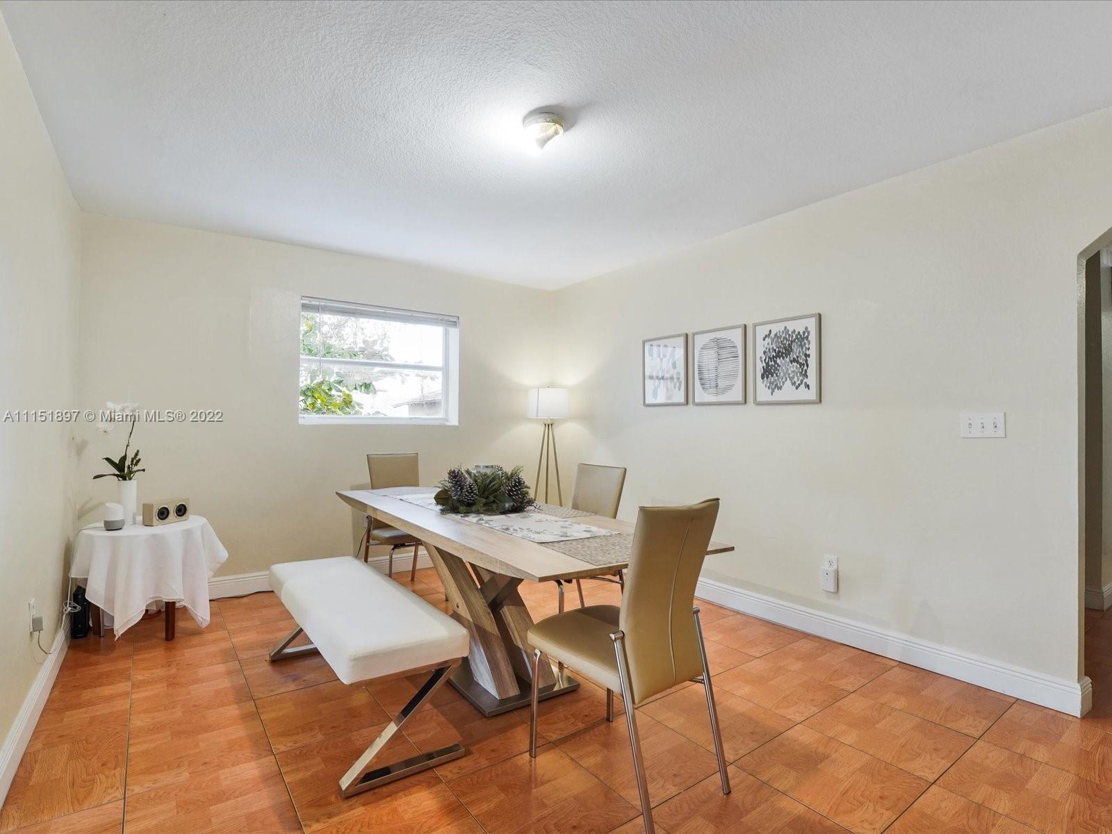 23 Northeast 46th Street Miami, FL 33137 - Photo 8 of 27 a workspace with furniture and window