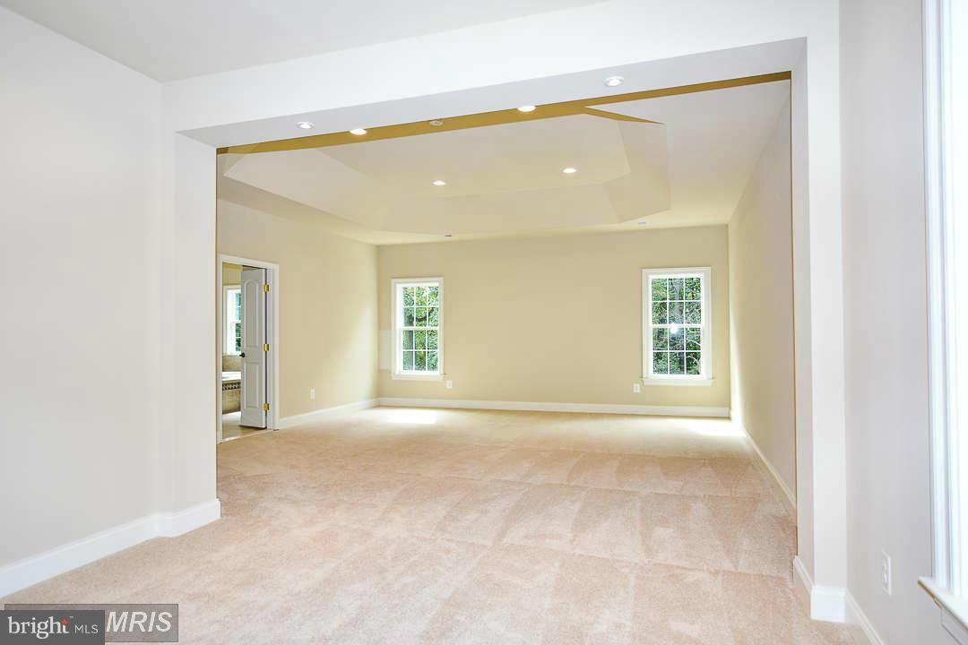 8536 Old Keene Mill Road Springfield, VA 22152 - Photo 19 of 30 a view of an empty room with a window