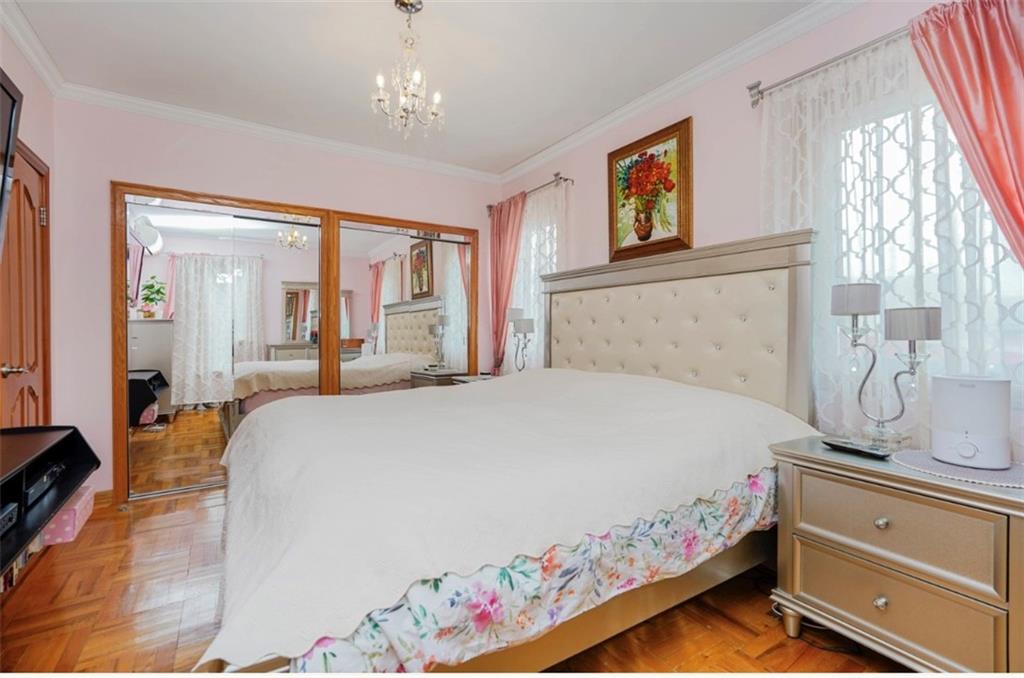 2623 Ave Y Brooklyn, NY 11235 - Photo 17 of 35 a bedroom with bed and window