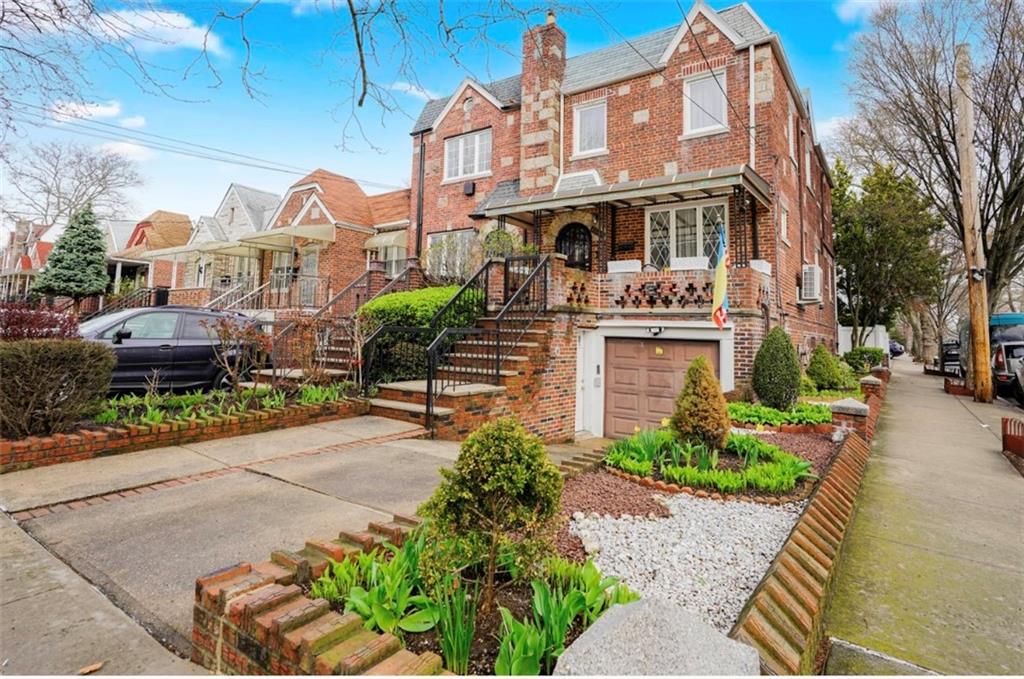 2623 Ave Y Brooklyn, NY 11235 - Photo 2 of 35 a front view of a house with a garden