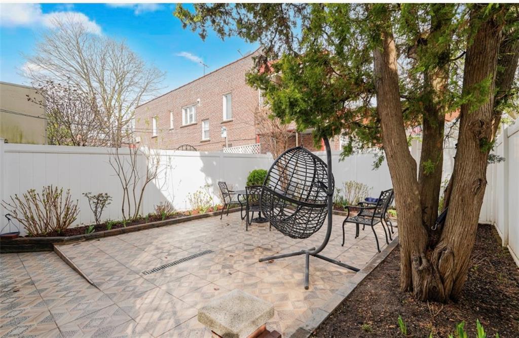 2623 Ave Y Brooklyn, NY 11235 - Photo 31 of 35 a view of a bench with wooden fence