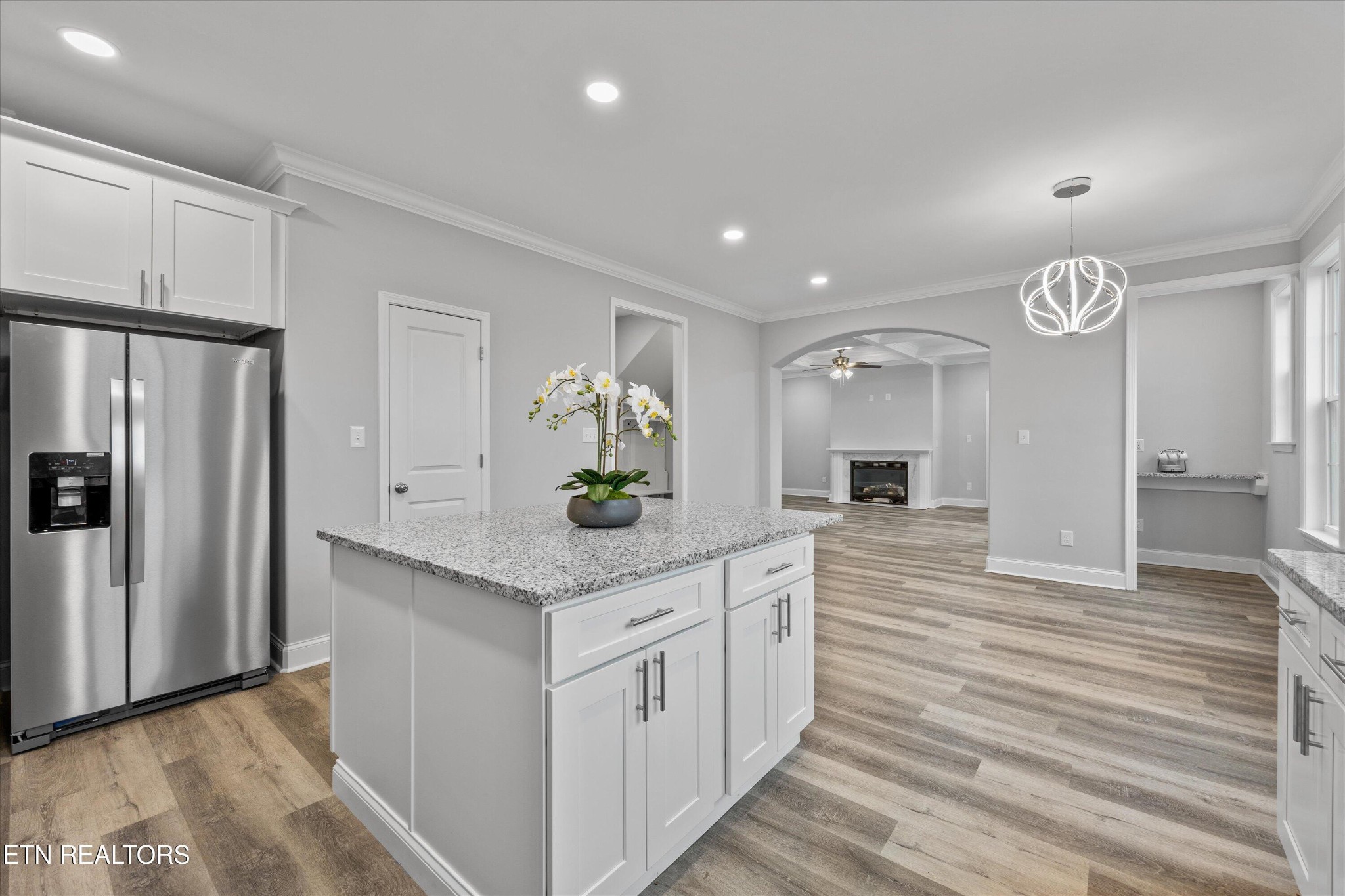5649 Belle Maison Lane Knoxville, TN 37920 - Photo 15 of 42 a kitchen with stainless steel appliances kitchen island granite countertop a refrigerator and a sink