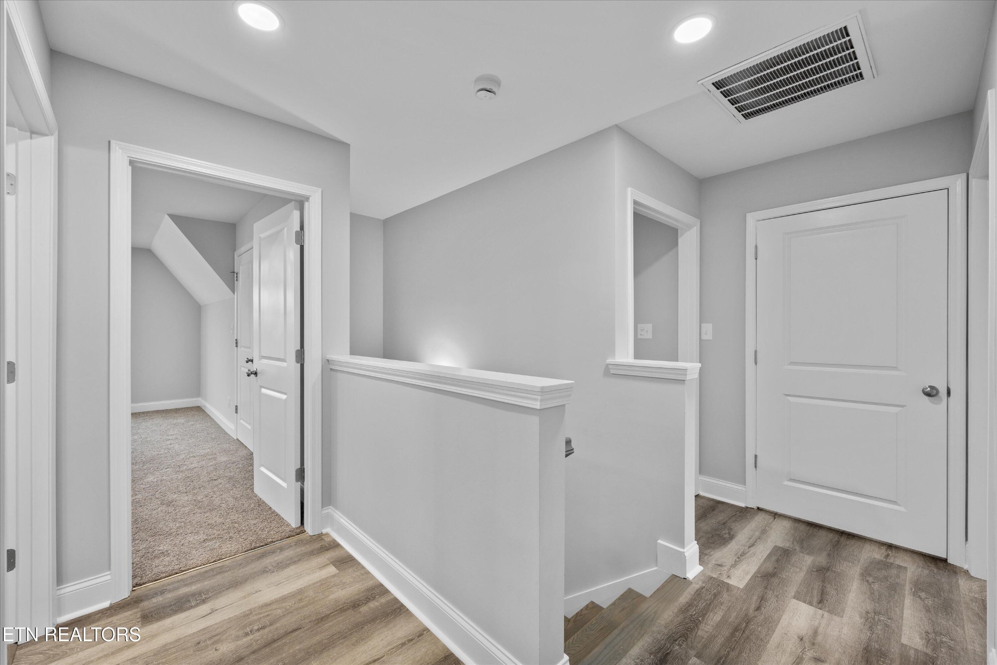 5649 Belle Maison Lane Knoxville, TN 37920 - Photo 24 of 42 a view of a hallway with wooden floor and closet