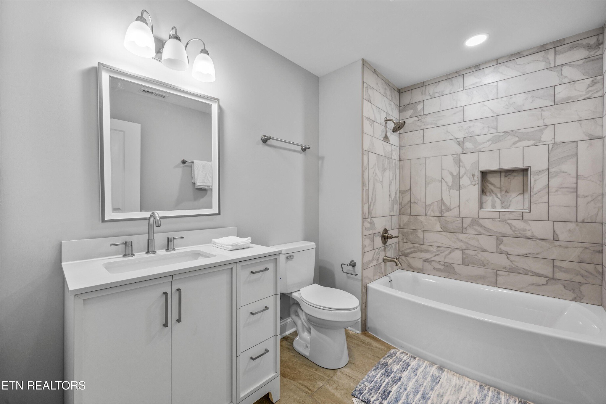 5649 Belle Maison Lane Knoxville, TN 37920 - Photo 26 of 42 a bathroom with a bathtub shower sink mirror and toilet
