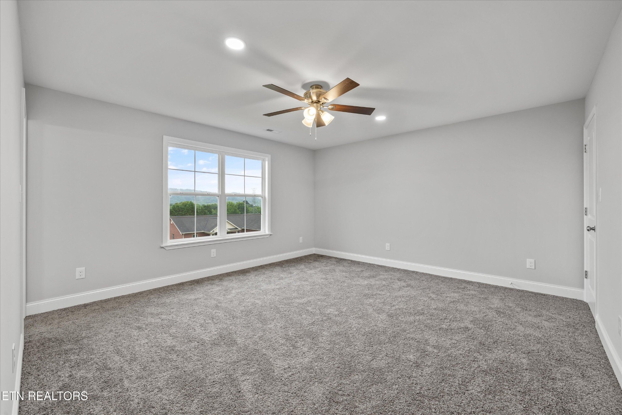 5649 Belle Maison Lane Knoxville, TN 37920 - Photo 27 of 42 a view of an empty room with a window