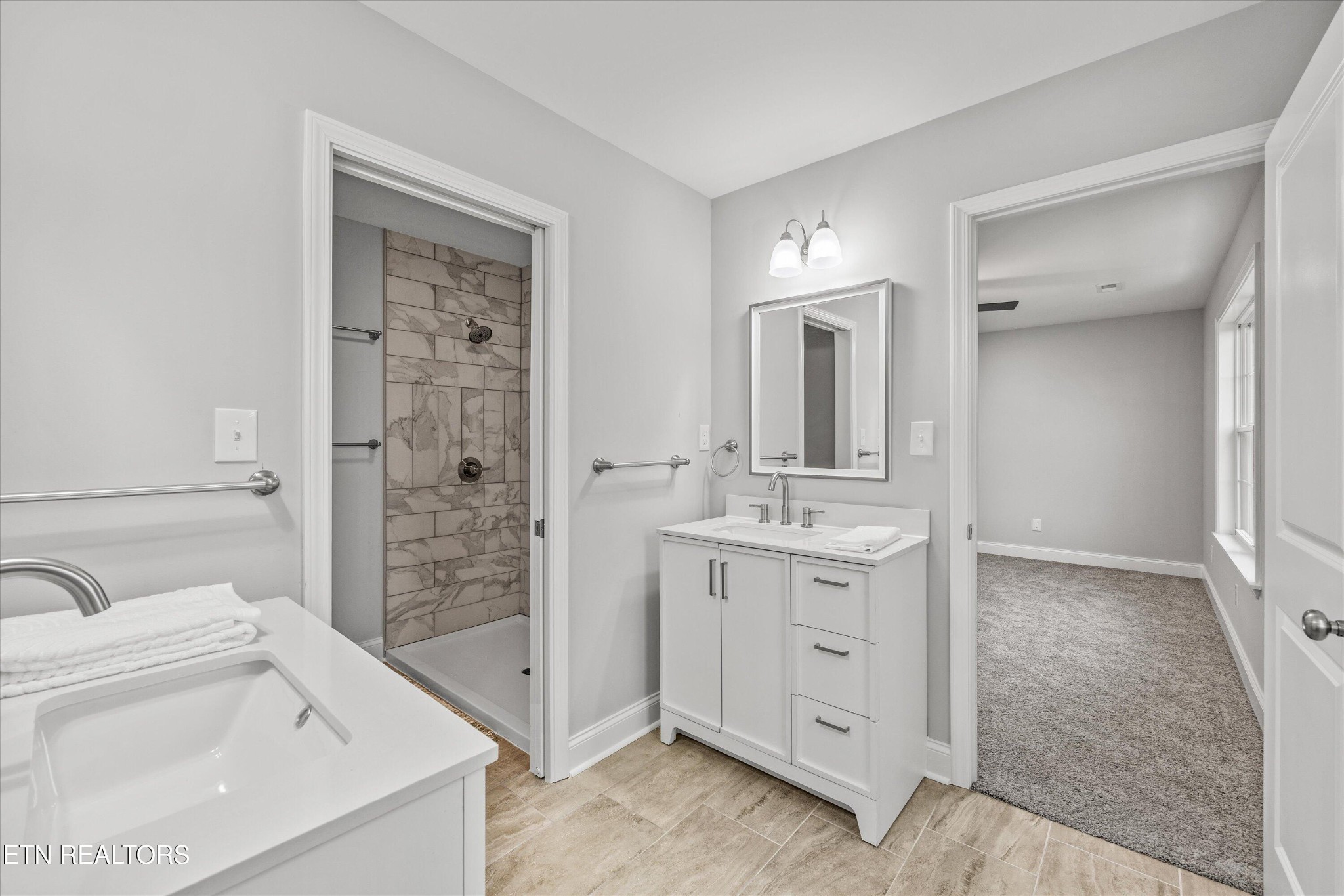 5649 Belle Maison Lane Knoxville, TN 37920 - Photo 28 of 42 a bathroom with a sink a toilet and shower