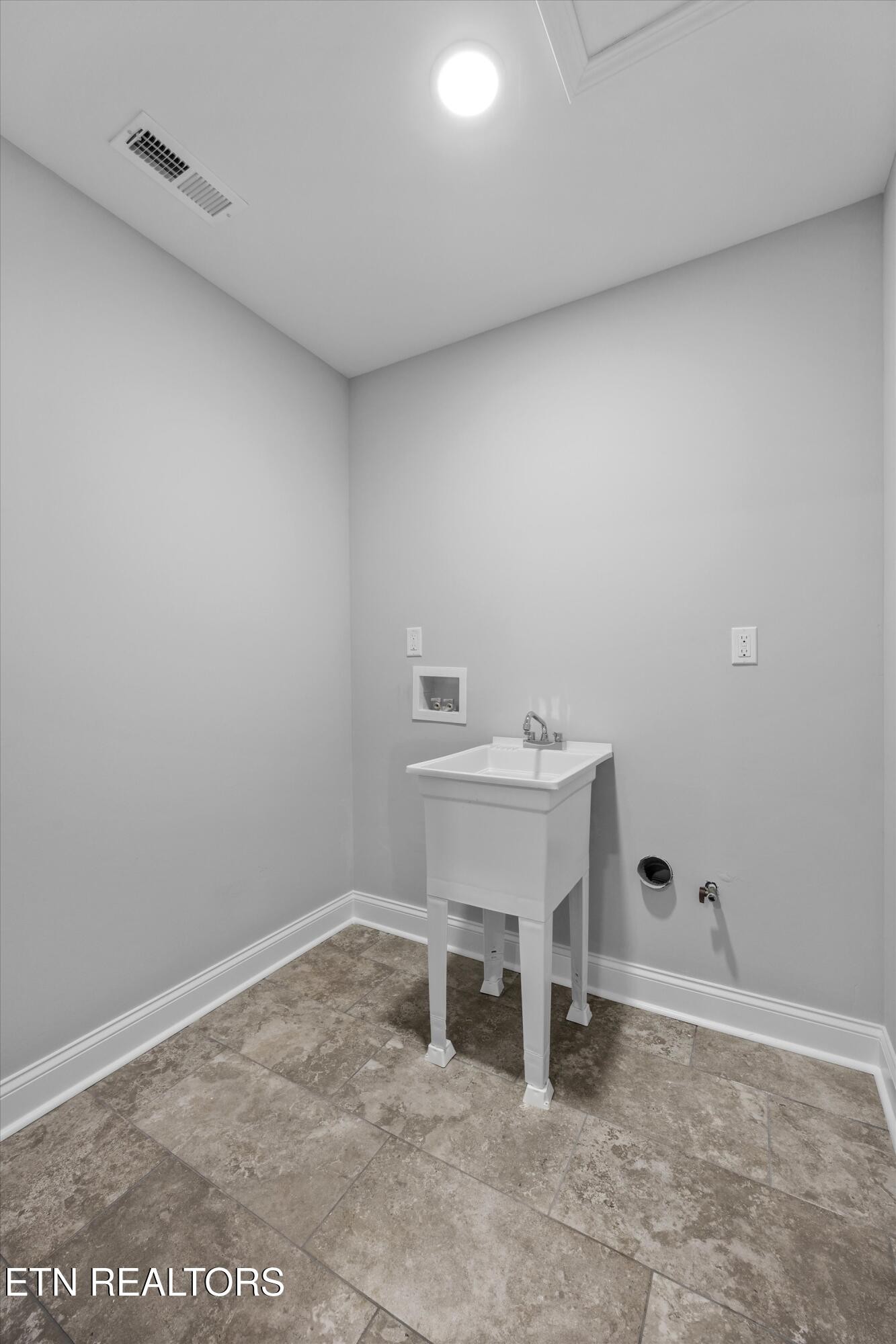 5649 Belle Maison Lane Knoxville, TN 37920 - Photo 30 of 42 a bathroom with a sink and a window