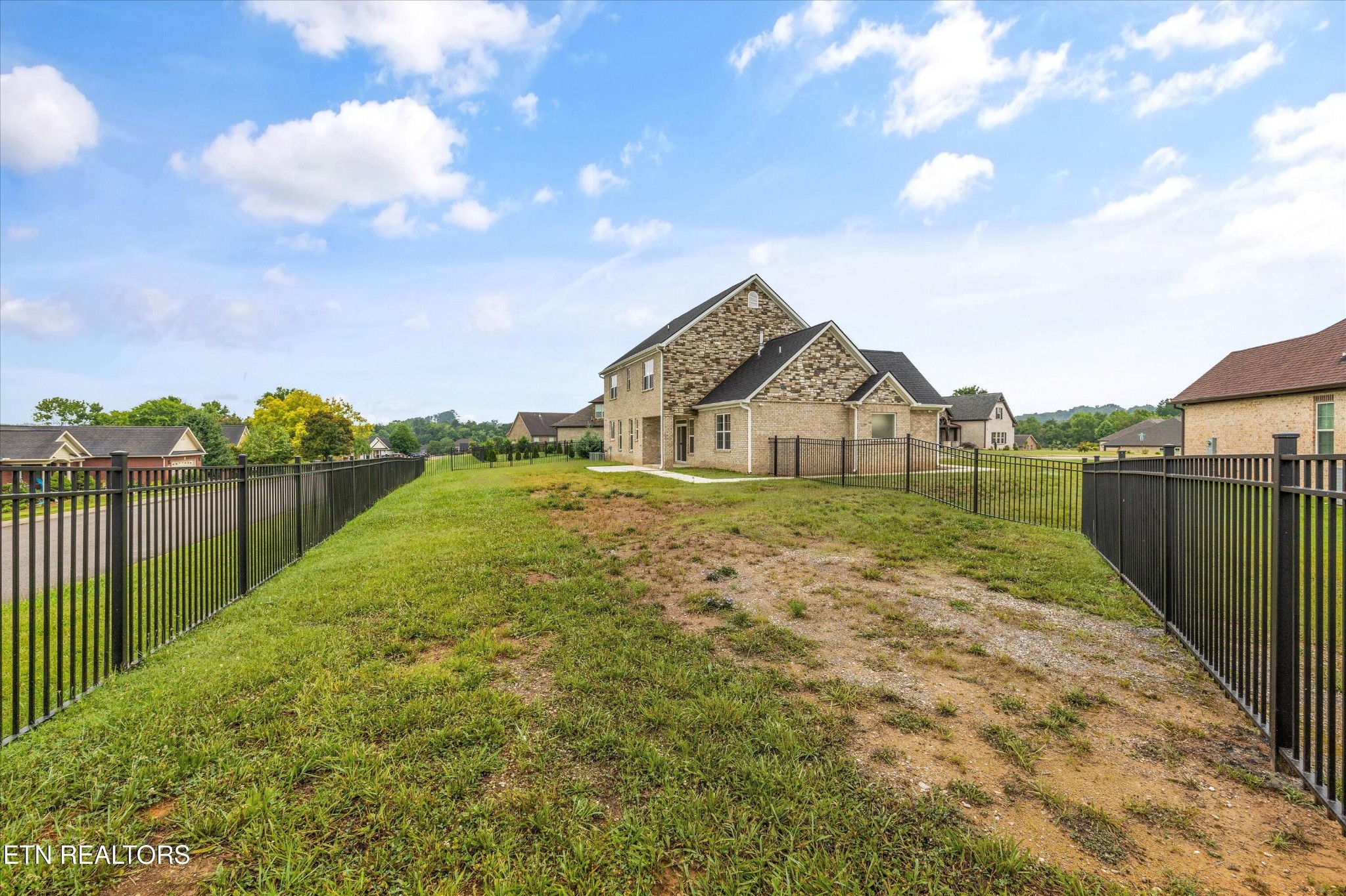 5649 Belle Maison Lane Knoxville, TN 37920 - Photo 35 of 42 a view of a house with a yard