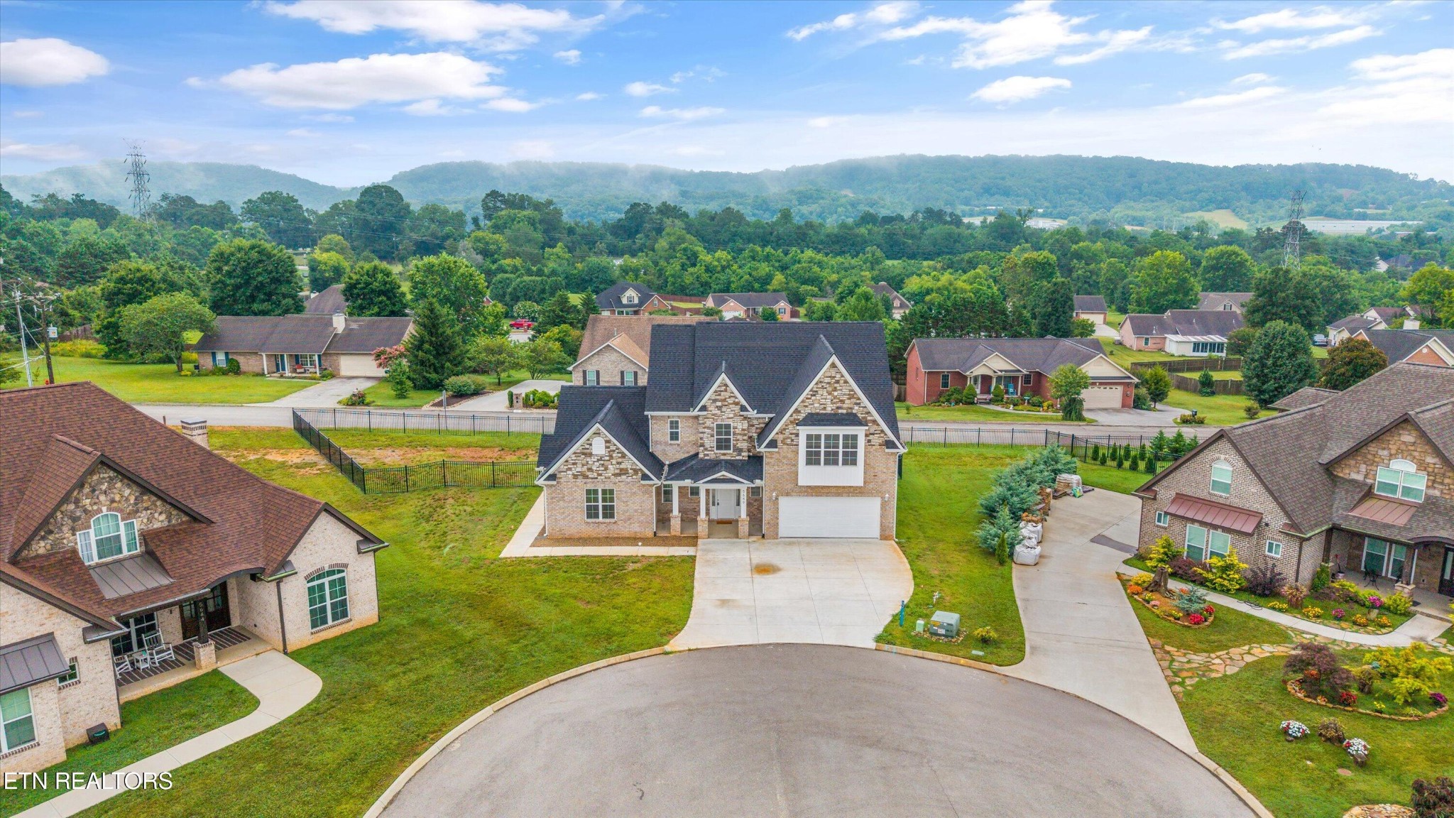 5649 Belle Maison Lane Knoxville, TN 37920 - Photo 37 of 42 an aerial view of a house with swimming pool garden and lake view