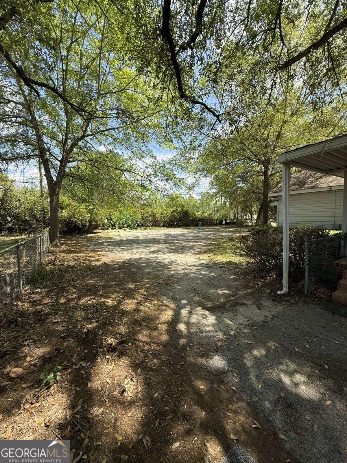 109 Vernon Street Dublin, GA 31021 - Photo 12 of 48 a view of a yard with an outdoor space