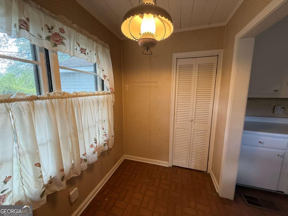 109 Vernon Street Dublin, GA 31021 - Photo 19 of 48 wooden floor in an empty room