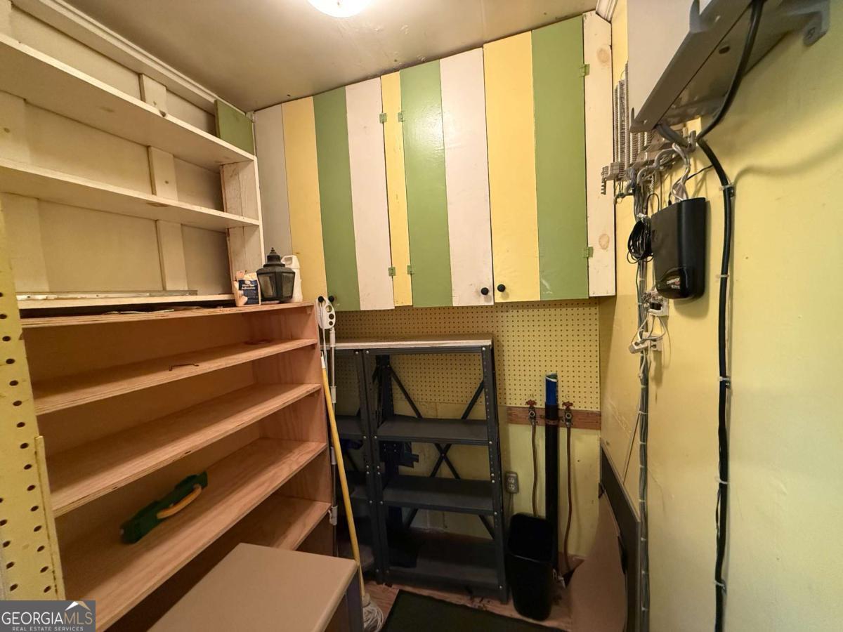 109 Vernon Street Dublin, GA 31021 - Photo 20 of 48 a view of a room with chairs in it