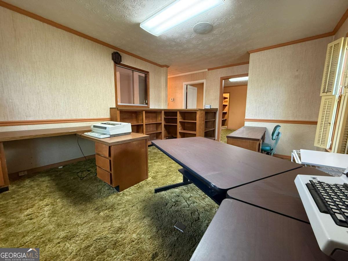 109 Vernon Street Dublin, GA 31021 - Photo 25 of 48 a room with furniture pool table and windows