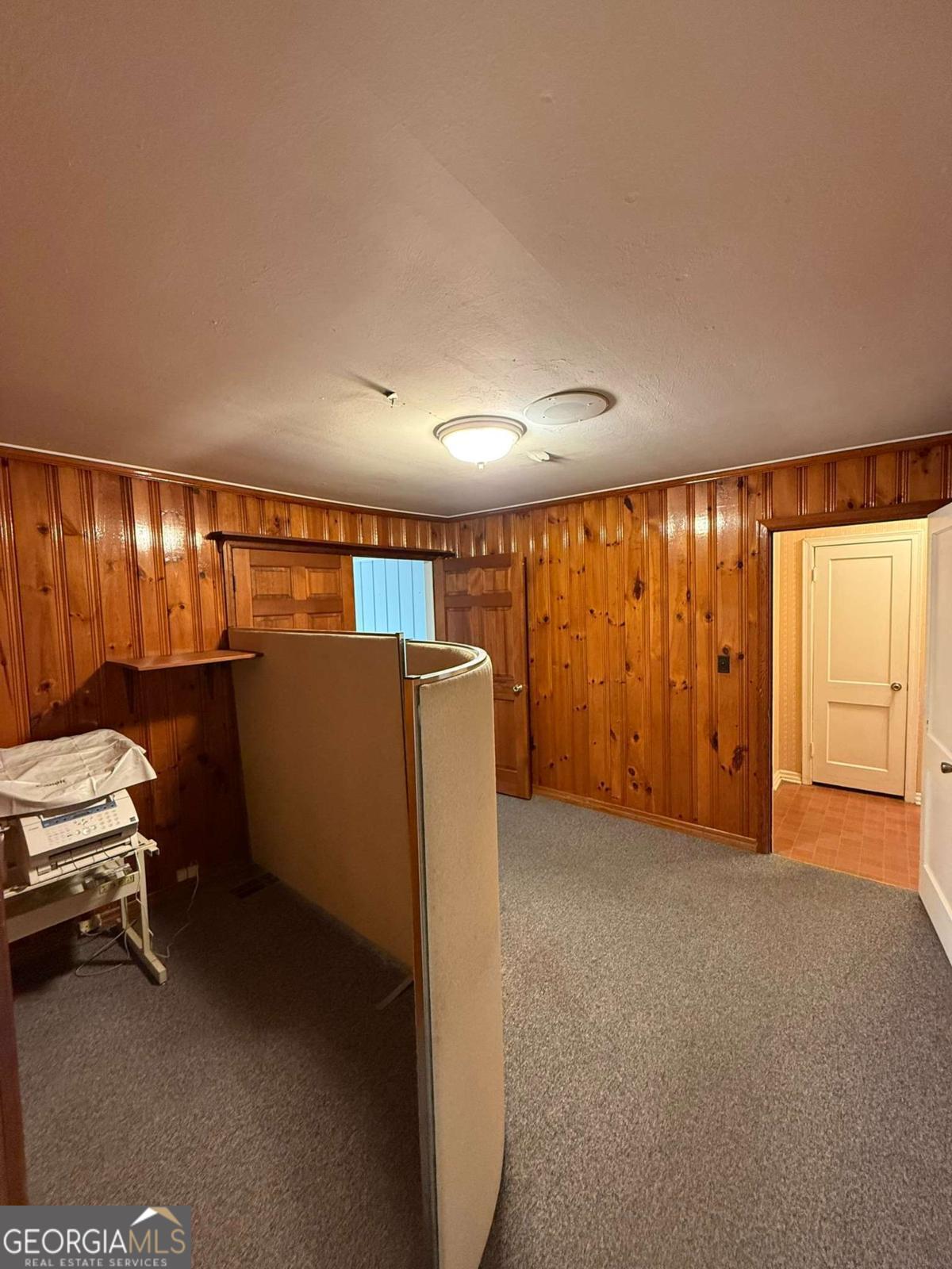 109 Vernon Street Dublin, GA 31021 - Photo 32 of 48 a view of a room with wooden floor and furniture