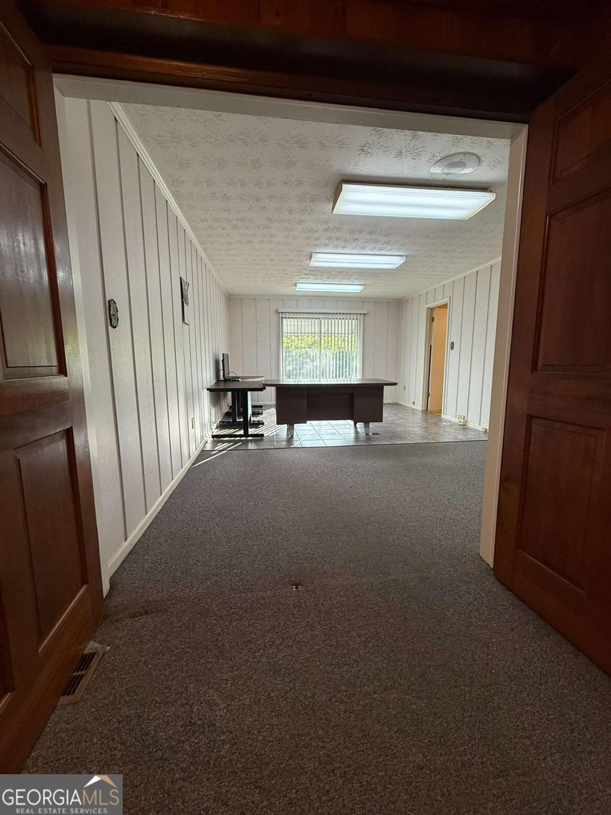 109 Vernon Street Dublin, GA 31021 - Photo 34 of 48 a view of empty room with wooden floor