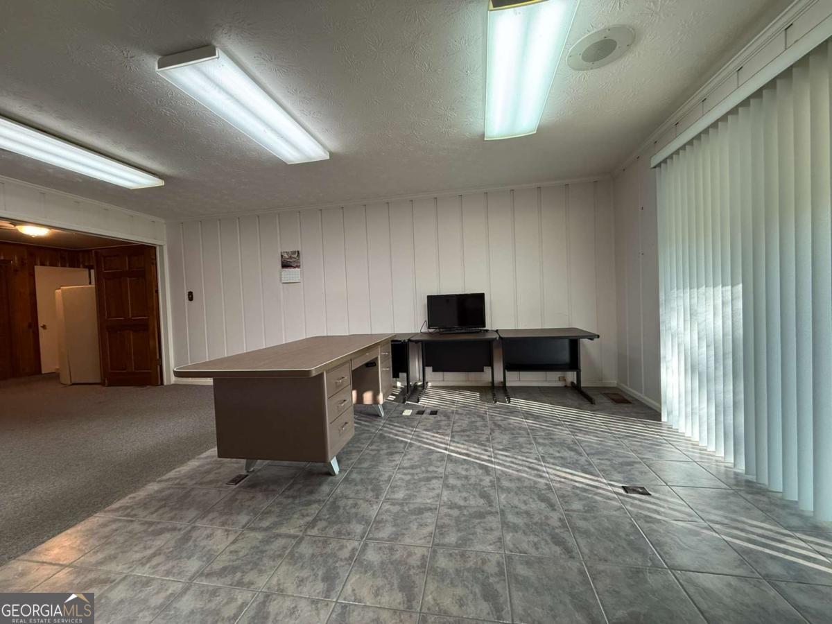 109 Vernon Street Dublin, GA 31021 - Photo 36 of 48 a view of work space with windows