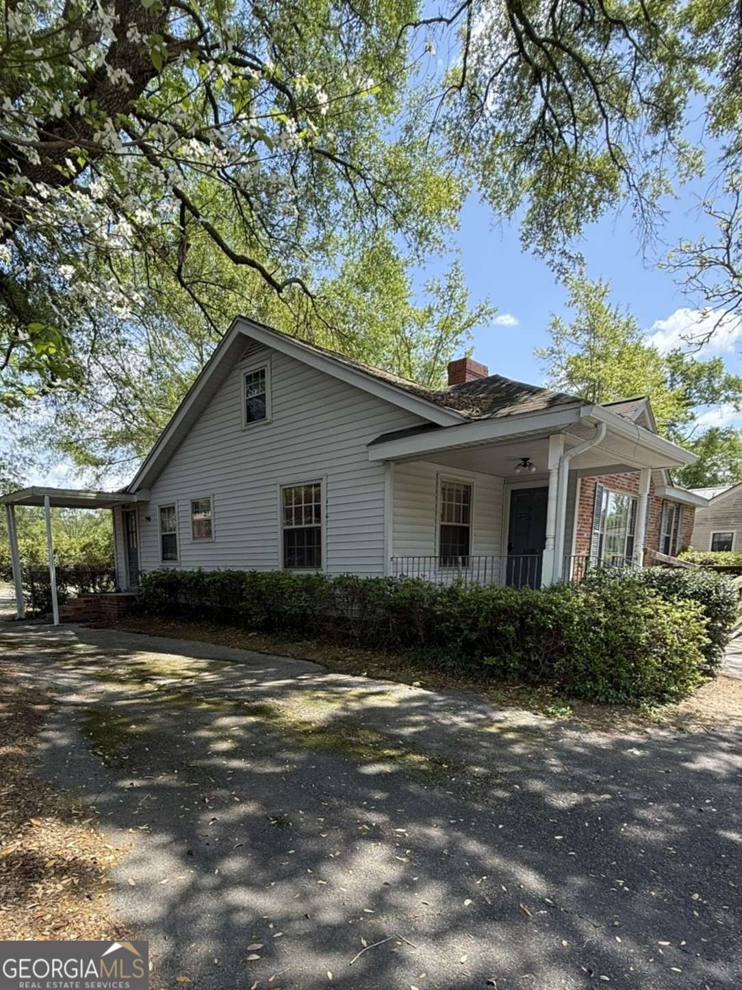 109 Vernon Street Dublin, GA 31021 - Photo 4 of 48 a view of a house with a patio