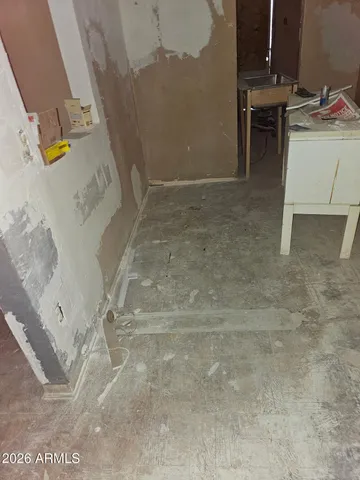 a bathroom with a granite countertop shower and a toilet