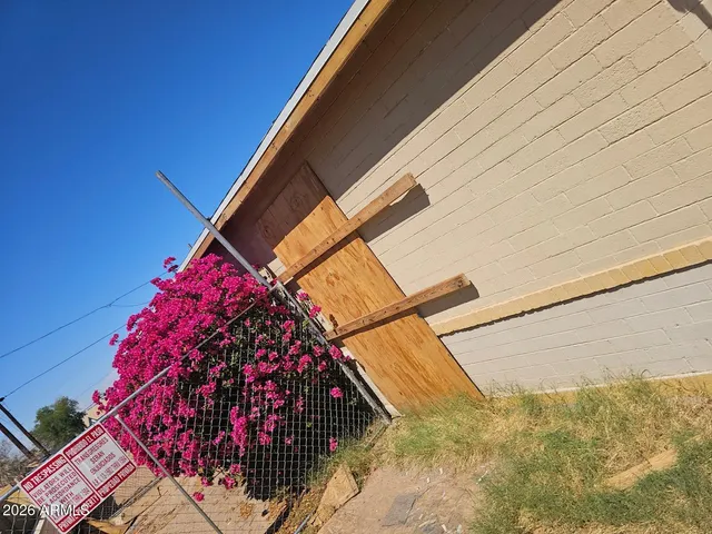 a side view of a house with a garage