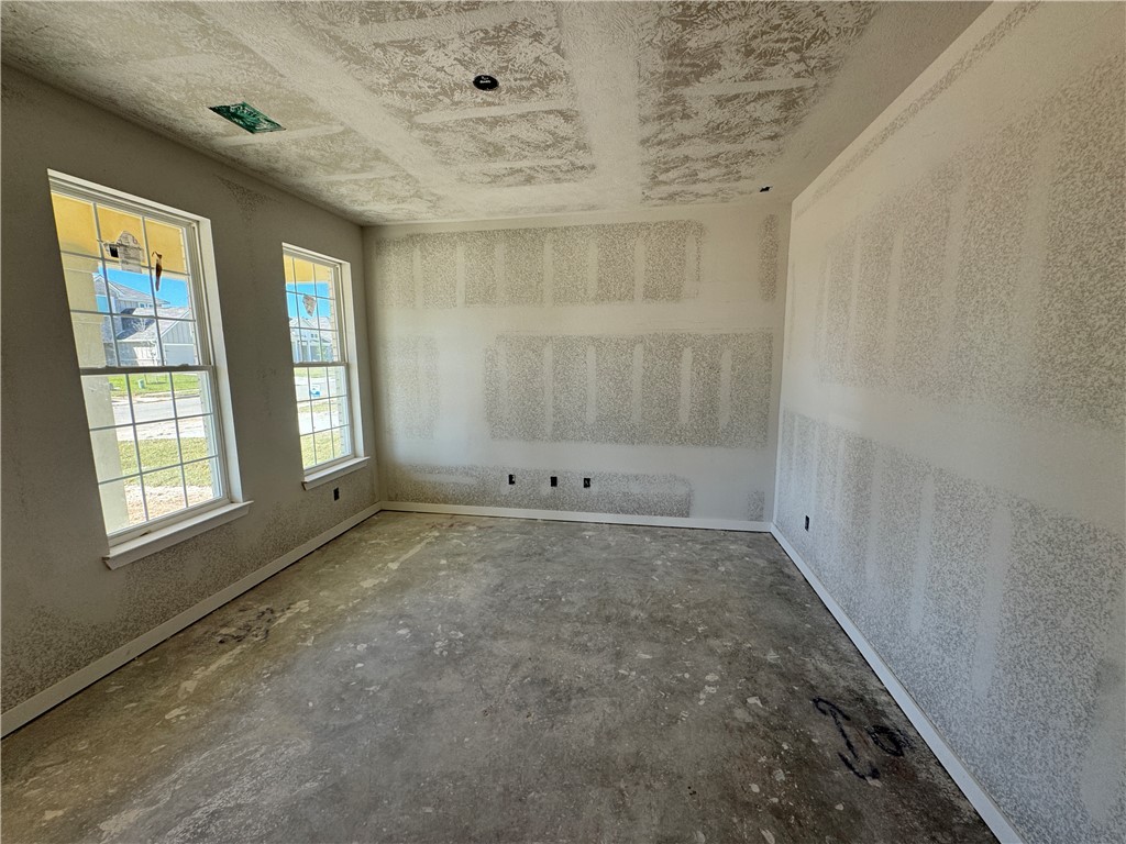 2416 Rooke Road Bryan, TX 77807 - Photo 3 of 17 a view of an empty room with a window