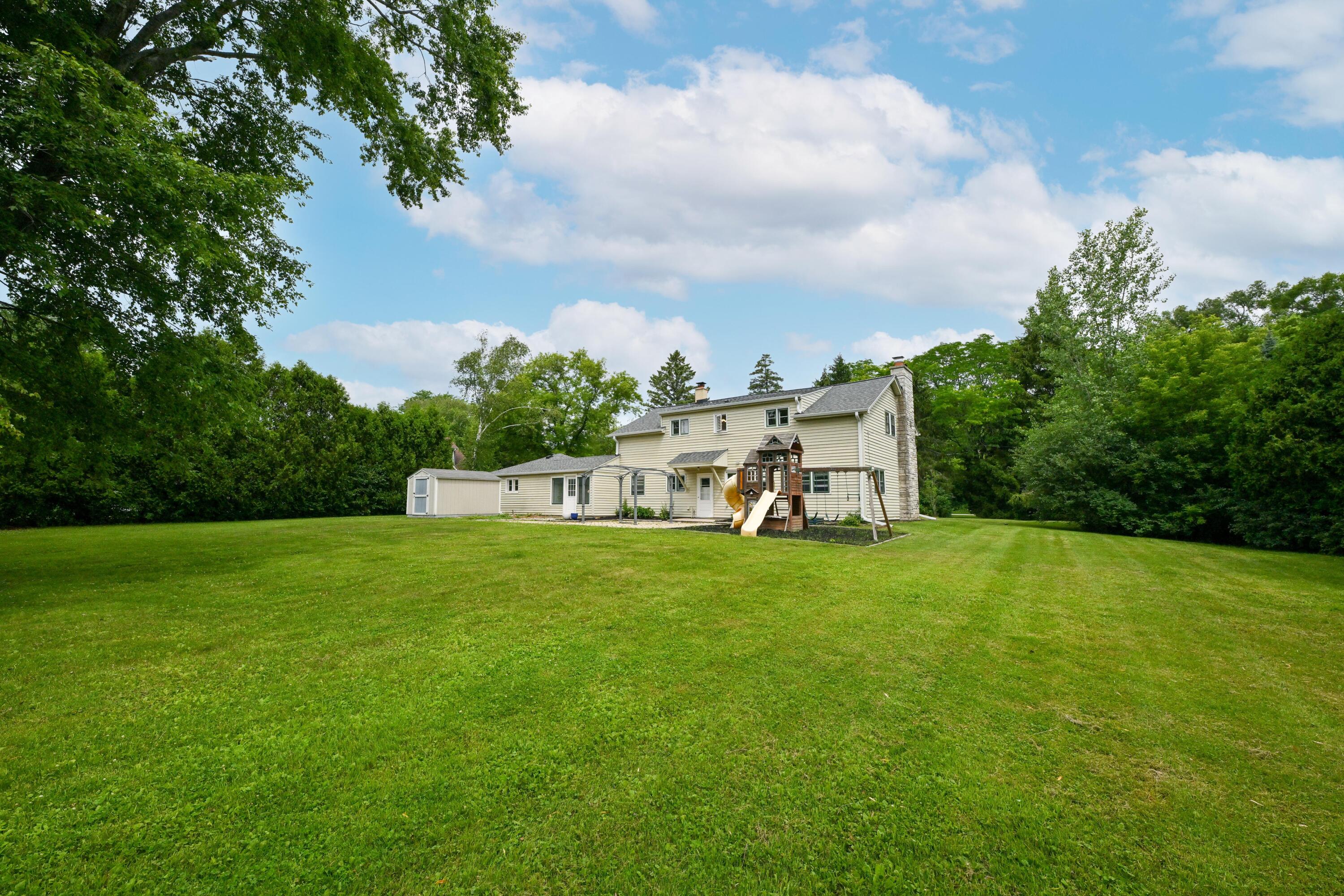 1933 West Donges Bay Road Mequon, WI 53092 - Photo 28 of 36 incredible backyard