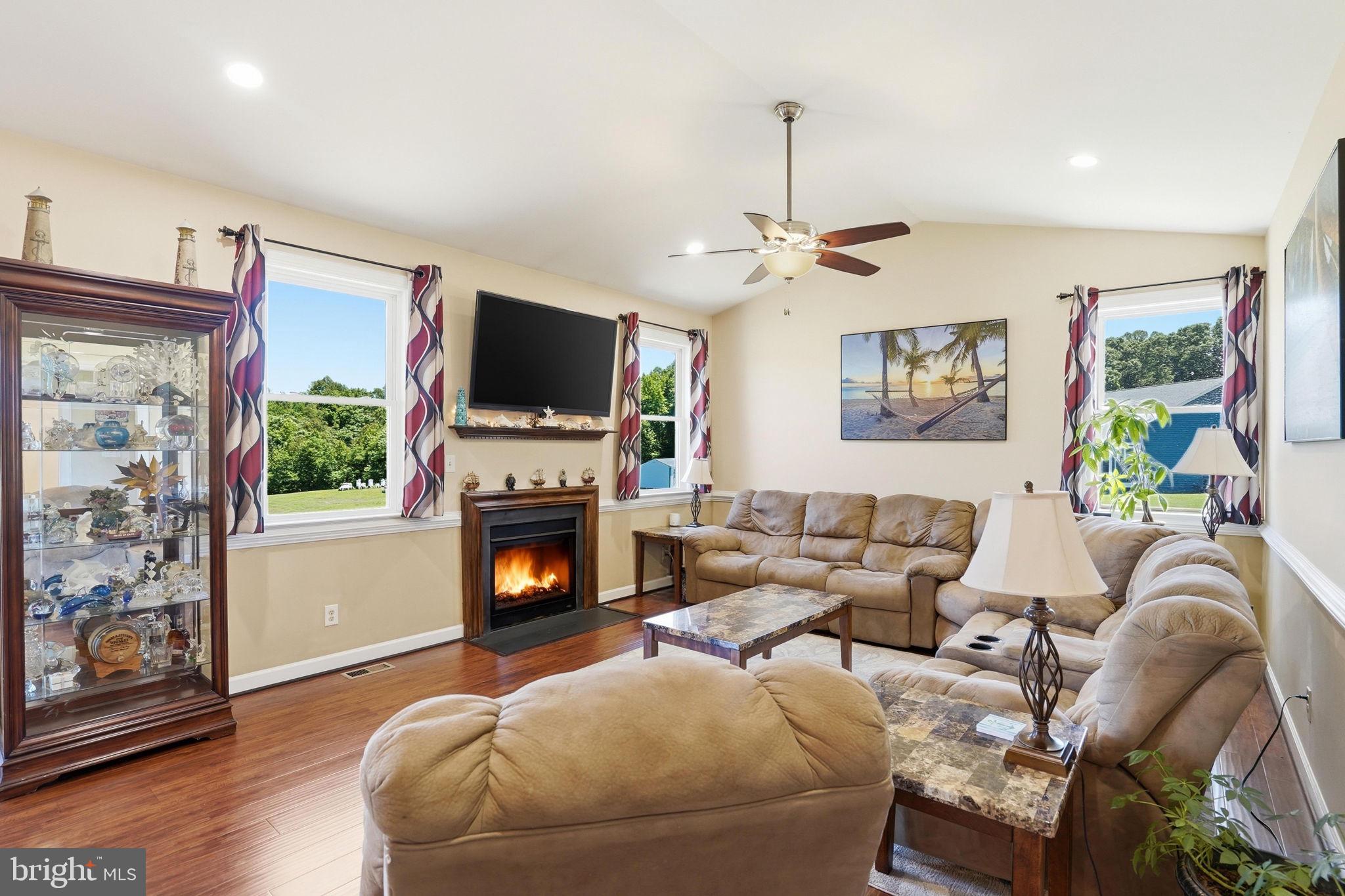 16111 Trigger Lane Colonial Beach, VA 22443 - Photo 16 of 53 A favorite of the sellers is the cozy fireplace!