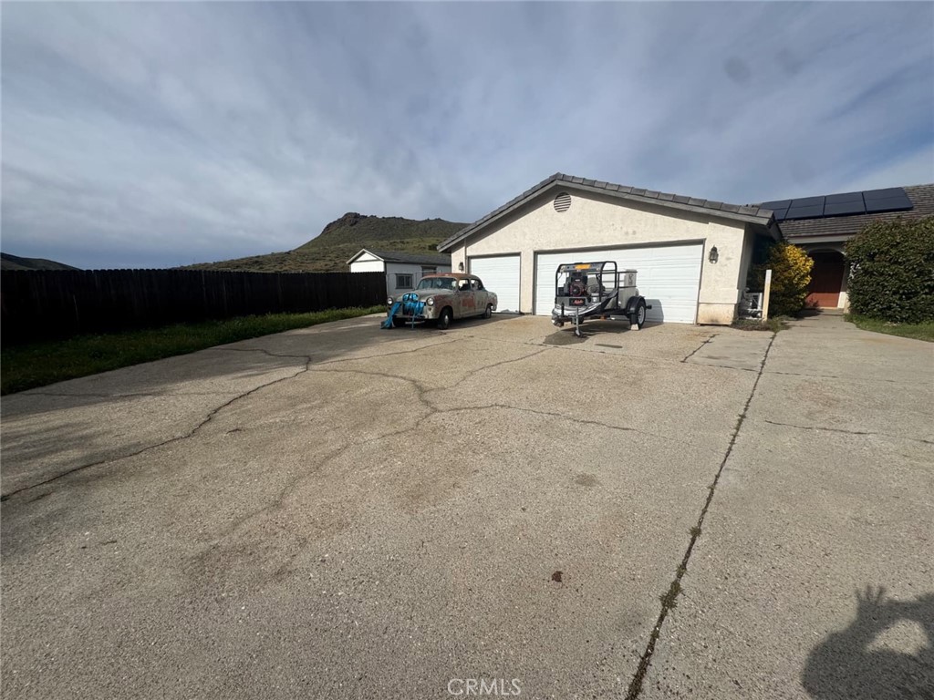 33125 Big Springs Road Acton, CA 93510 - Photo 3 of 11 a view of house with car parked