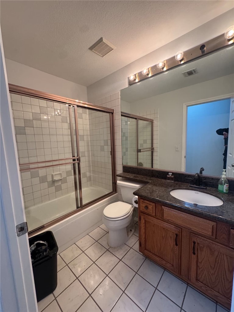 33125 Big Springs Road Acton, CA 93510 - Photo 9 of 11 a bathroom with a granite countertop sink toilet and mirror