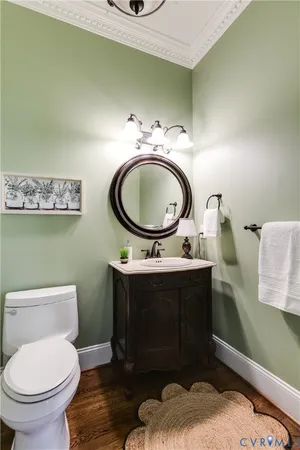 a white bath tub sitting in a bathroom next to a window