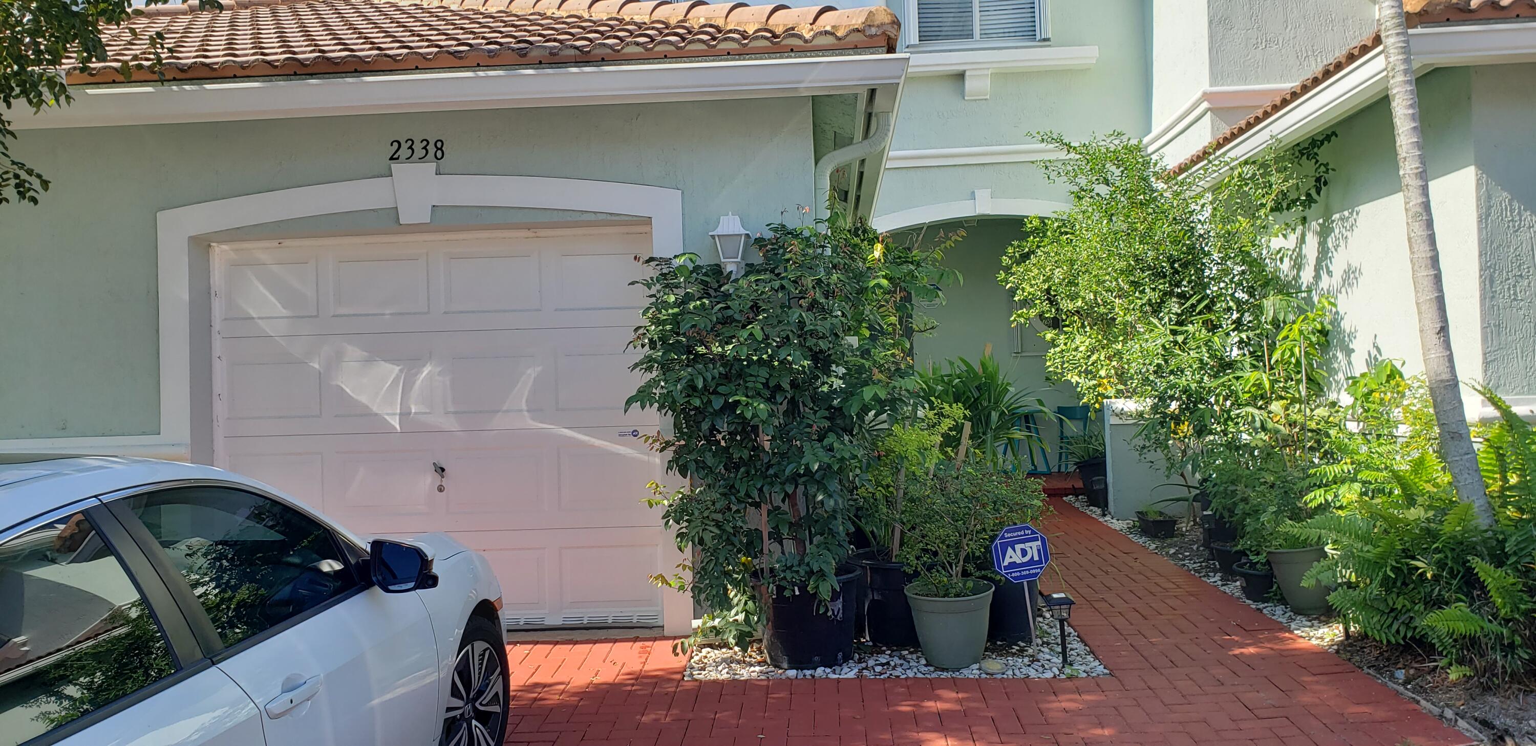 2338 Center Stone Lane Riviera Beach, FL 33404 - Photo 2 of 12 20220127_113533