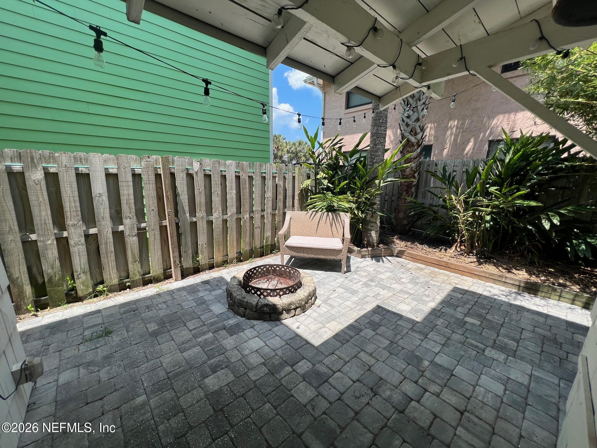 809 2nd Street South Jacksonville Beach, FL 32250 - Photo 10 of 13 a view of a backyard with plants and some plants