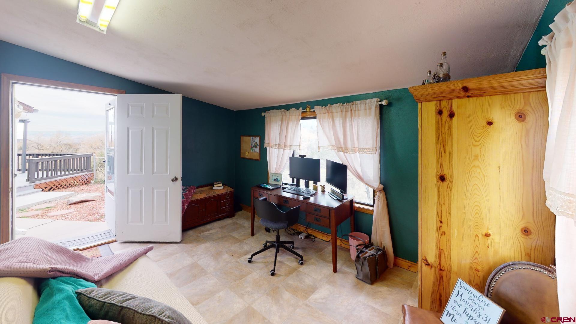 18377 Highway 65 Cedaredge, CO 81413 - Photo 32 of 35 a workspace with furniture and a window