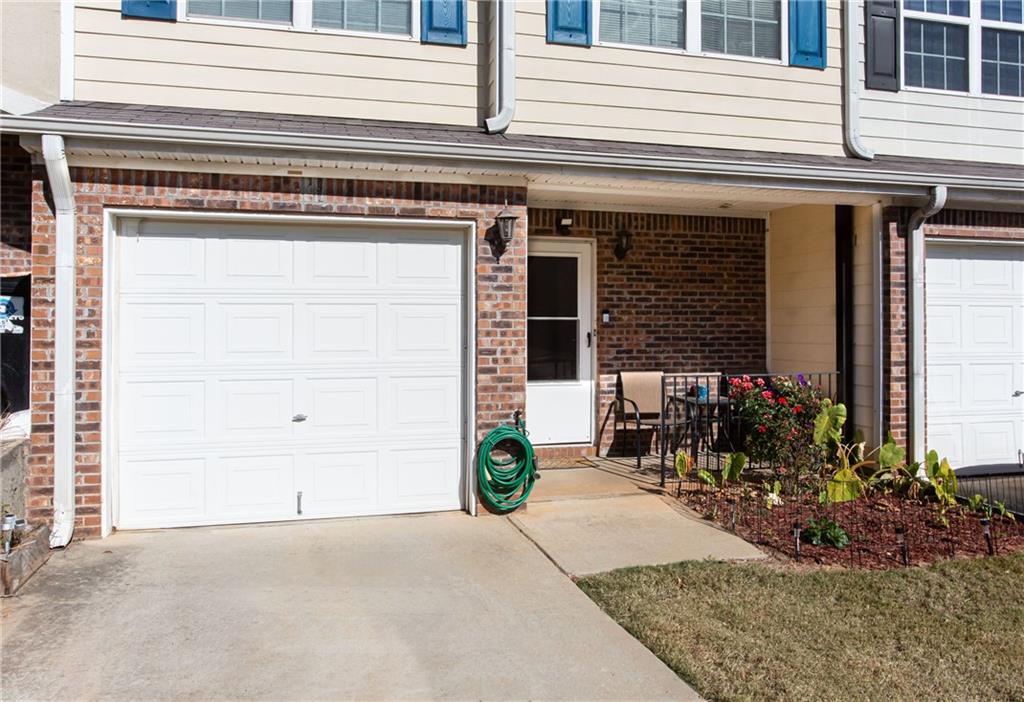690 Georgetown Lane Jonesboro, GA 30236 - Photo 2 of 30 a view of a house with potted plants