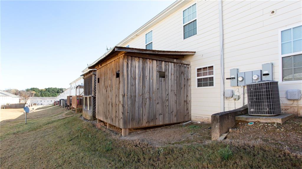 690 Georgetown Lane Jonesboro, GA 30236 - Photo 5 of 30 a view of a house with a yard