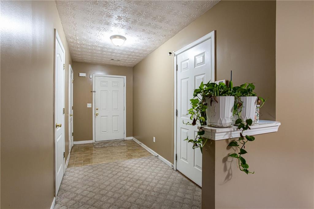 690 Georgetown Lane Jonesboro, GA 30236 - Photo 8 of 30 a view of entryway with livingroom