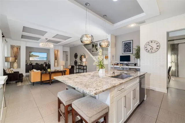 a bedroom with a bed couch and window