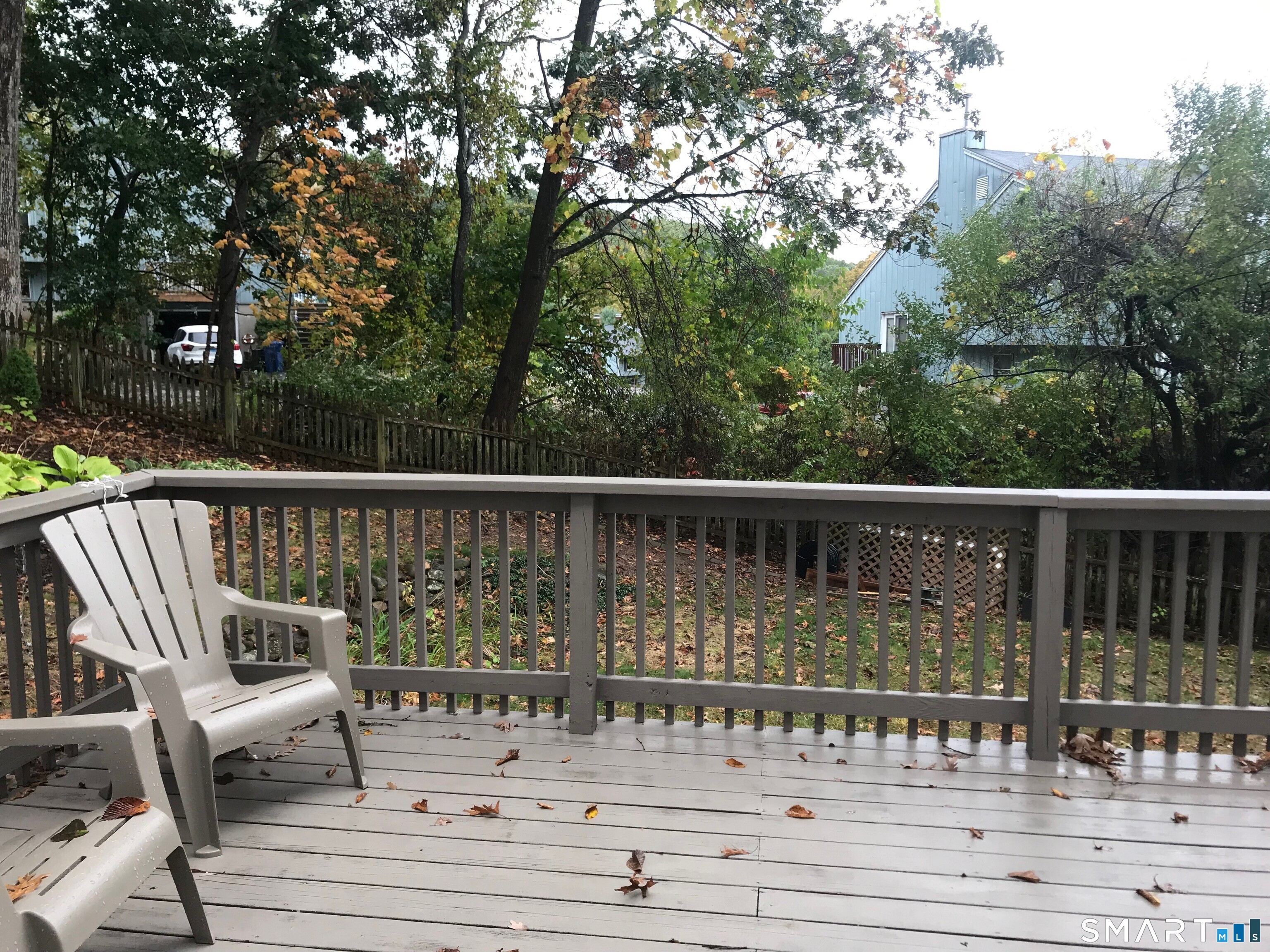 224 Anns Farm Road Hamden, CT 06518 - Photo 17 of 17 a view of a chair and tables