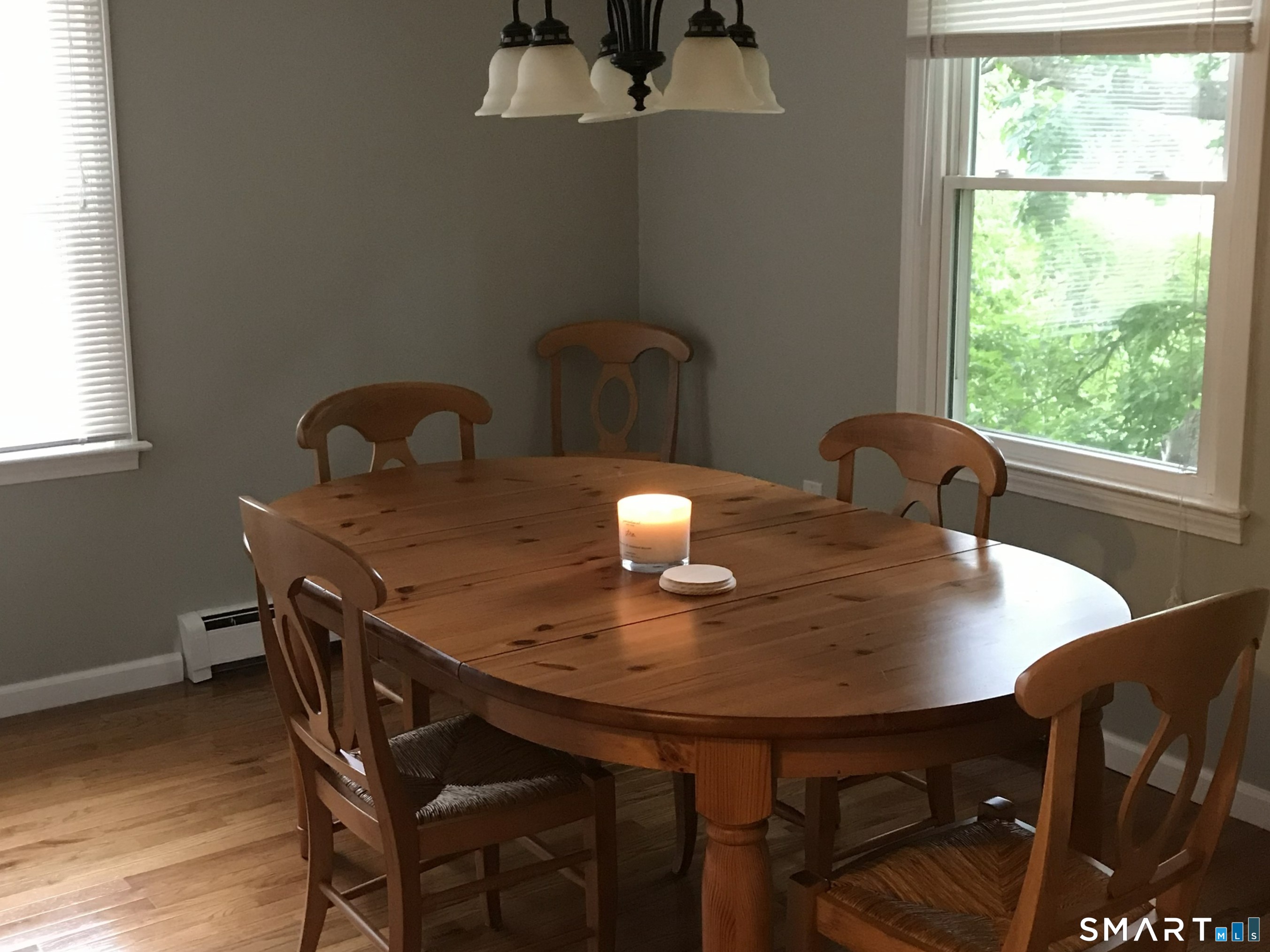 224 Anns Farm Road Hamden, CT 06518 - Photo 4 of 17 a view of a dining table and chairs