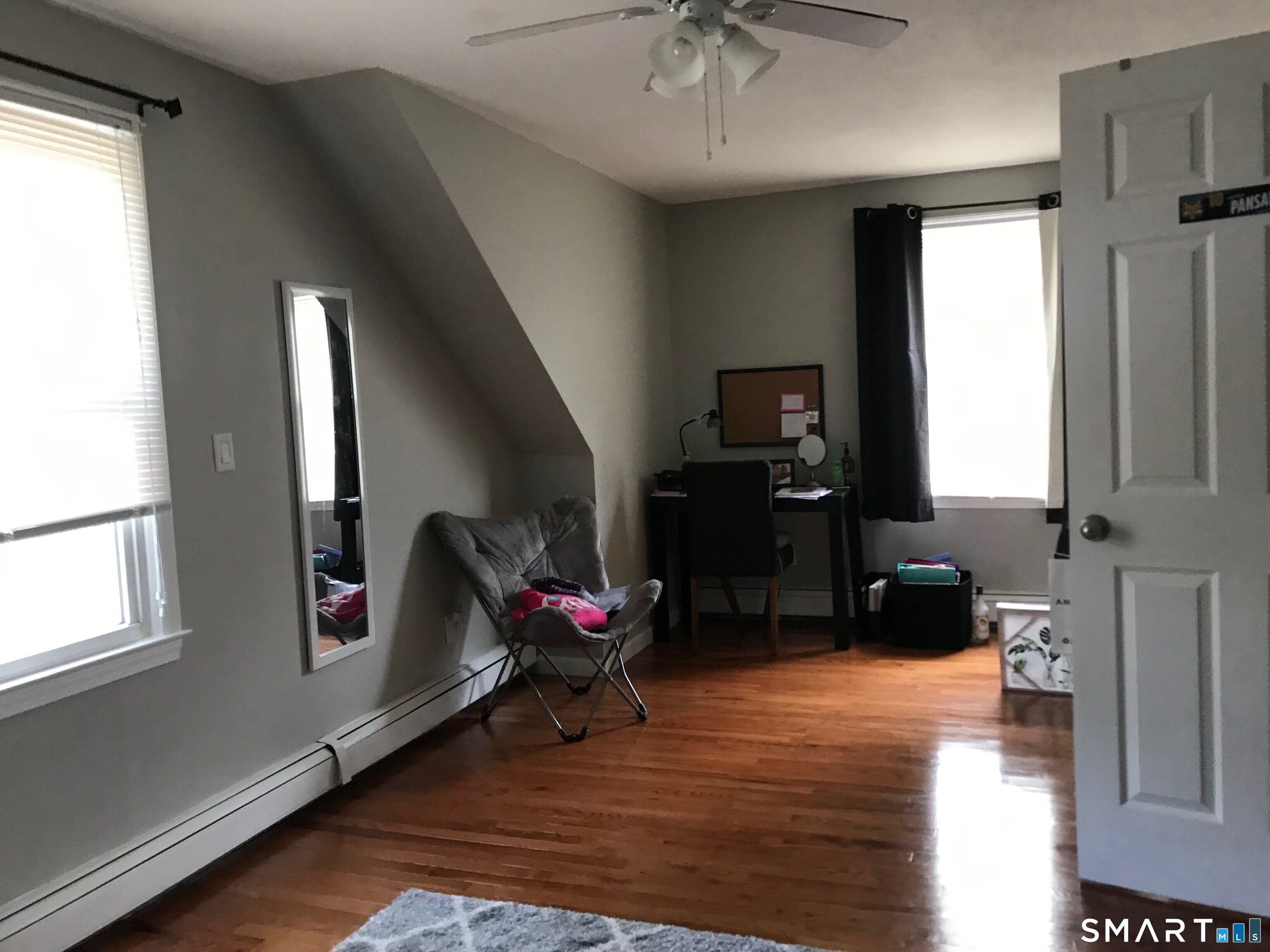 224 Anns Farm Road Hamden, CT 06518 - Photo 7 of 17 a living room with furniture and a flat screen tv