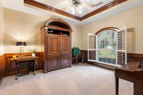 a open kitchen with granite countertop a sink and a stove