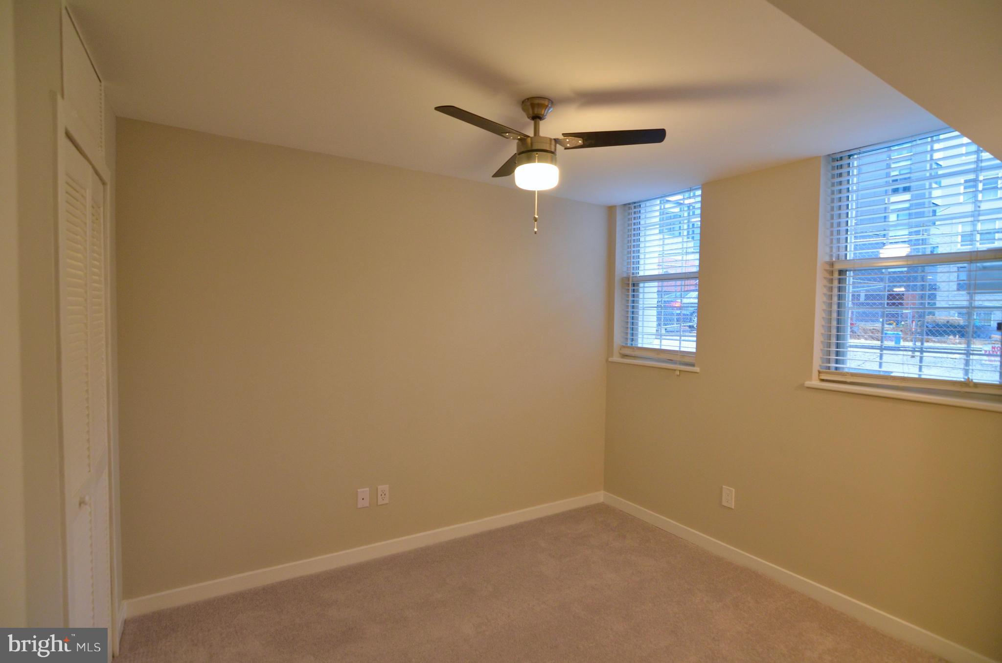 2114 N Street Northwest, Unit 2 Washington, DC 20037 - Photo 12 of 24 a view of an empty room with a window