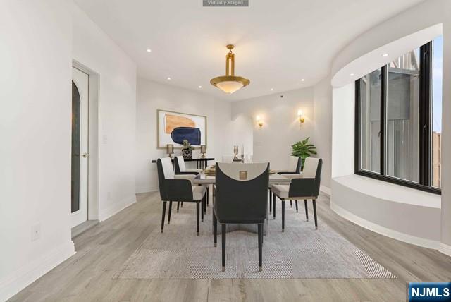 100 Carlyle Drive, Unit PHDN Cliffside Park, NJ 07010 - Photo 9 of 39 a view of a dining room with furniture