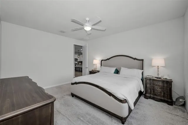 a view of a backyard with sitting area