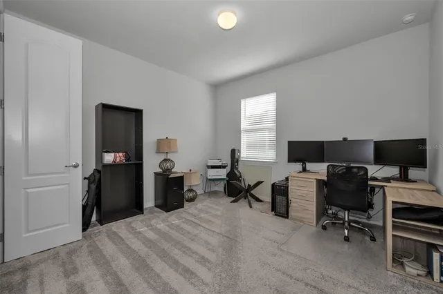 a view of a house with backyard