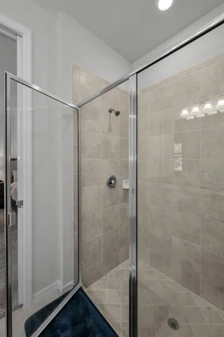 an aerial view of house with yard and lake view